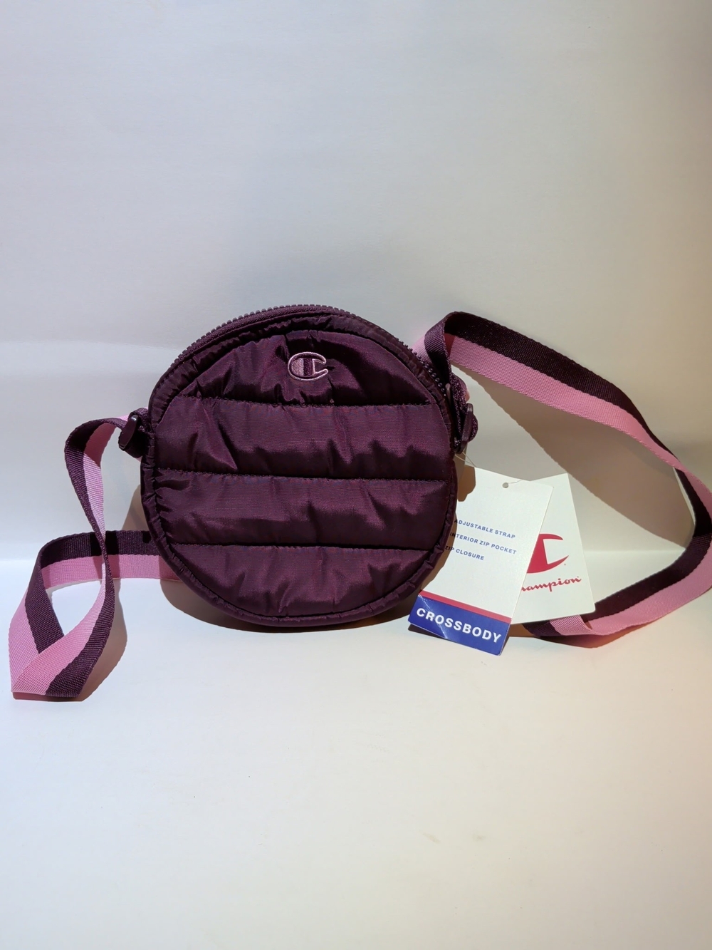Champion Quilted Round Crossbody in Plum with Pink Strap